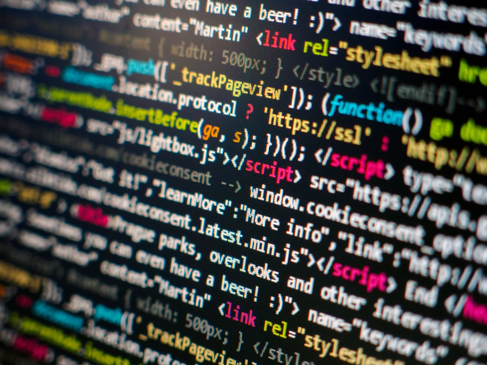 Developer screen with highlighted JavaScript functions and HTML markup in a code editor