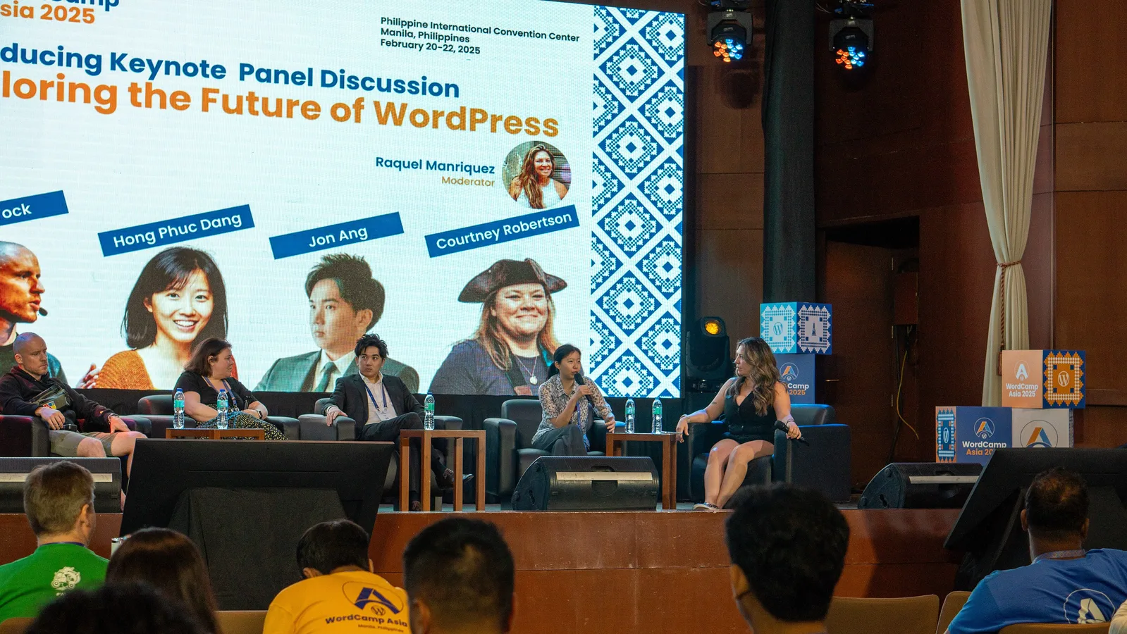 Panelists seated on stage under a screen reading Exploring the Future of WordPress at WordCamp Asia 2025