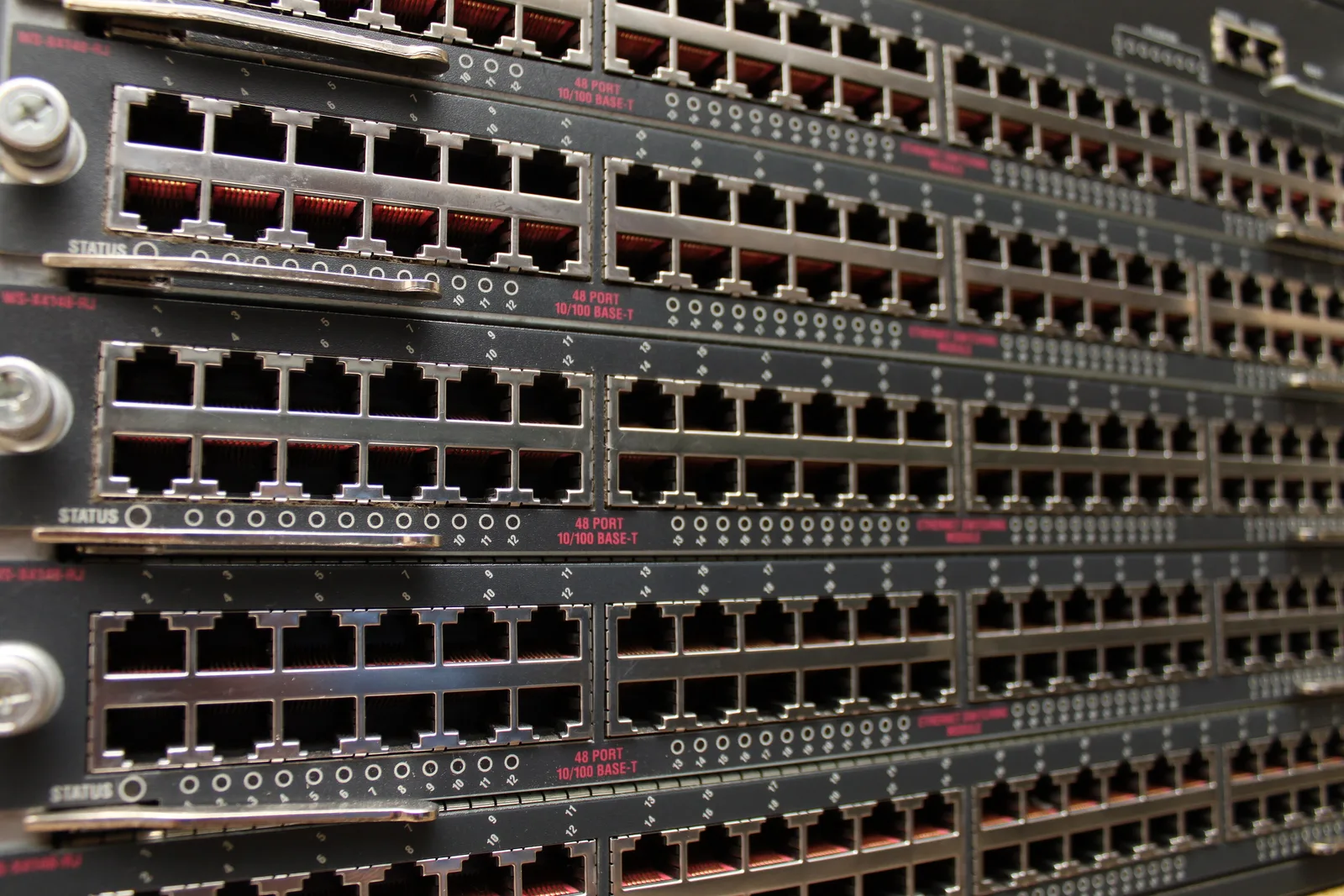 Close-up of rows of RJ-45 Ethernet ports on a rack-mounted network switch